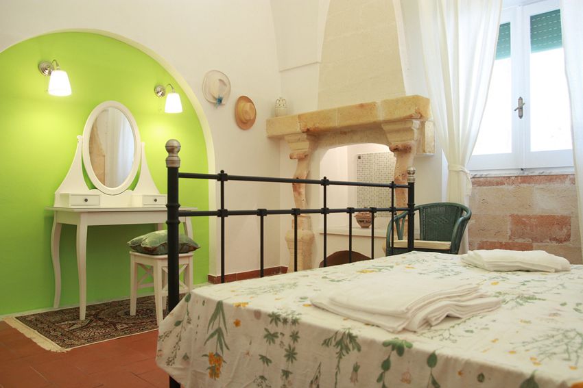 Immagine della camera da letto della Masseria Lapica